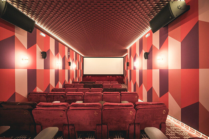 historic parisian cinema is reborn in wes anderson-like pastel hues and velvet touches