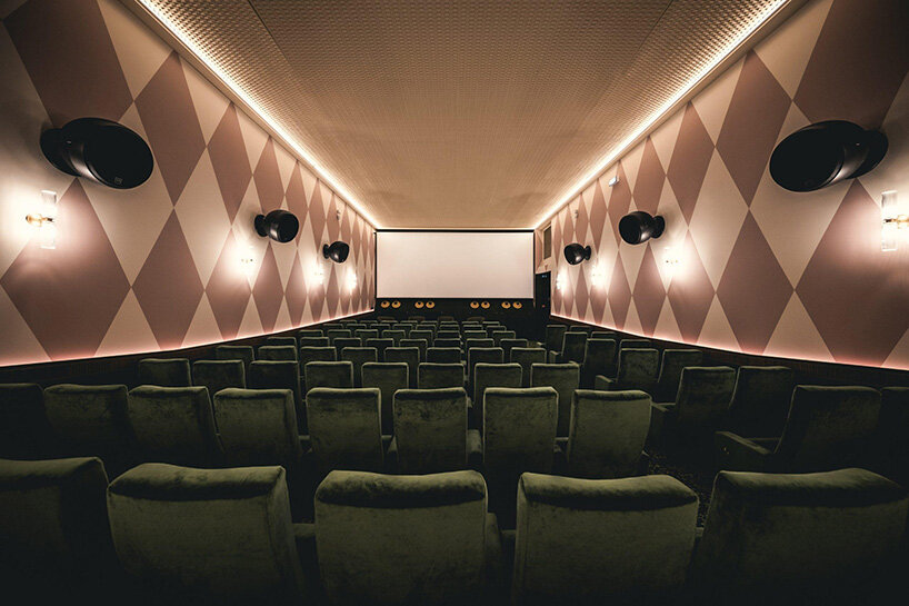 historic parisian cinema is reborn in wes anderson-like pastel hues and velvet touches