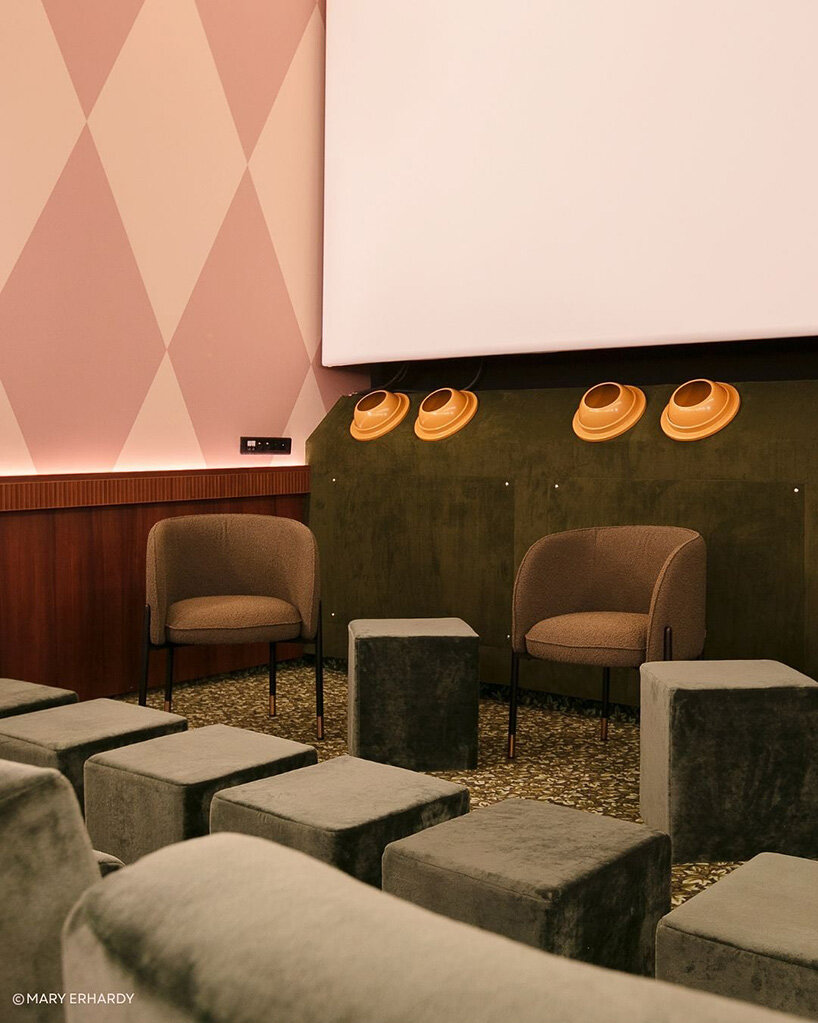 historic parisian cinema is reborn in wes anderson-like pastel hues and velvet touches