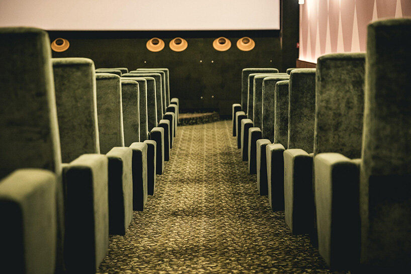 historic parisian cinema is reborn in wes anderson-like pastel hues and velvet touches