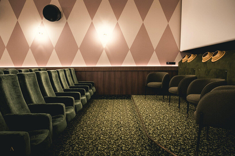 historic parisian cinema is reborn in wes anderson-like pastel hues and velvet touches