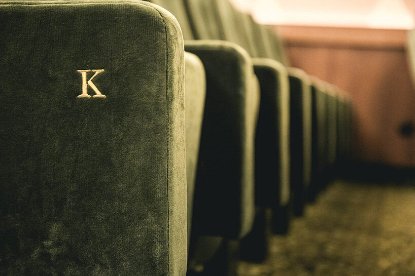 historic parisian cinema is reborn in wes anderson-like pastel hues and velvet touches