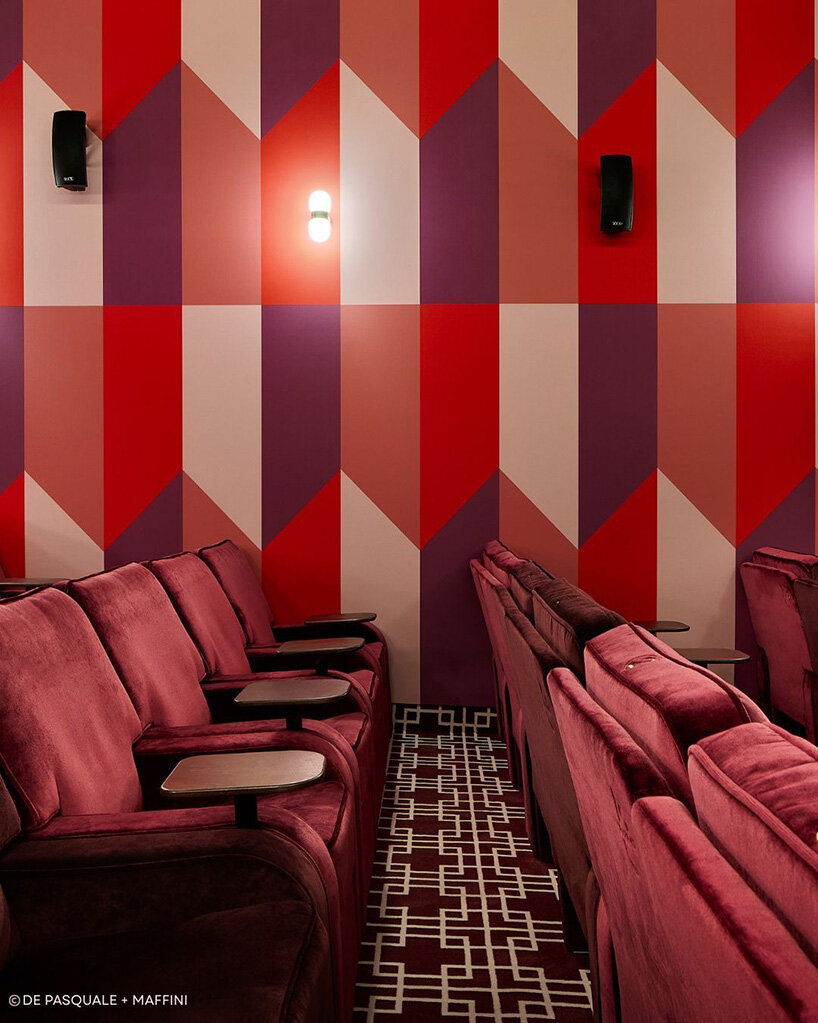 historic parisian cinema is reborn in wes anderson-like pastel hues and velvet touches