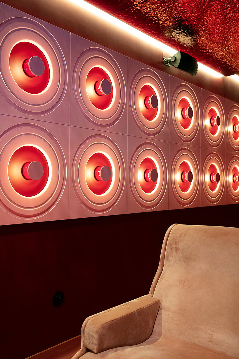 historic parisian cinema is reborn in wes anderson-like pastel hues and velvet touches