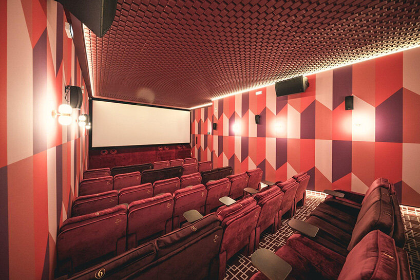 historic parisian cinema is reborn in wes anderson-like pastel hues and velvet touches