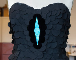 how a bird’s ultrablack feathers inspired researchers to create the darkest fabric ever made