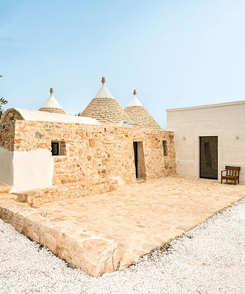 three traditional stone-domed trulli fuse with contemporary residence by studio8 in italy