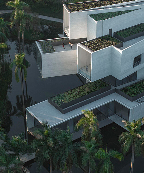 link-arc shapes shunde museum as stack of rotating tubes to frame wetland views