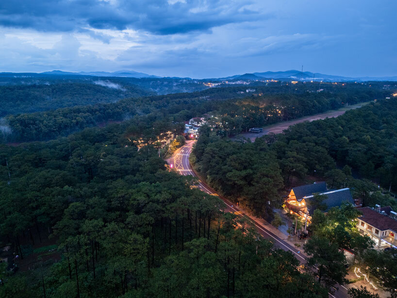 interlinked peaks shape bistro’s rhythmic canopy echoing mountain ridge in vietnam