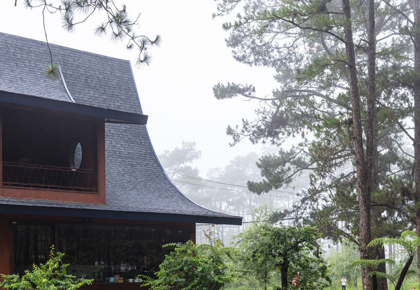 interlinked peaks shape bistro’s rhythmic canopy echoing mountain ridge in vietnam