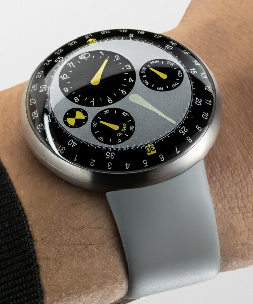 marc newson crafts ressence watch with hands suspended in removable oil-filled chamber