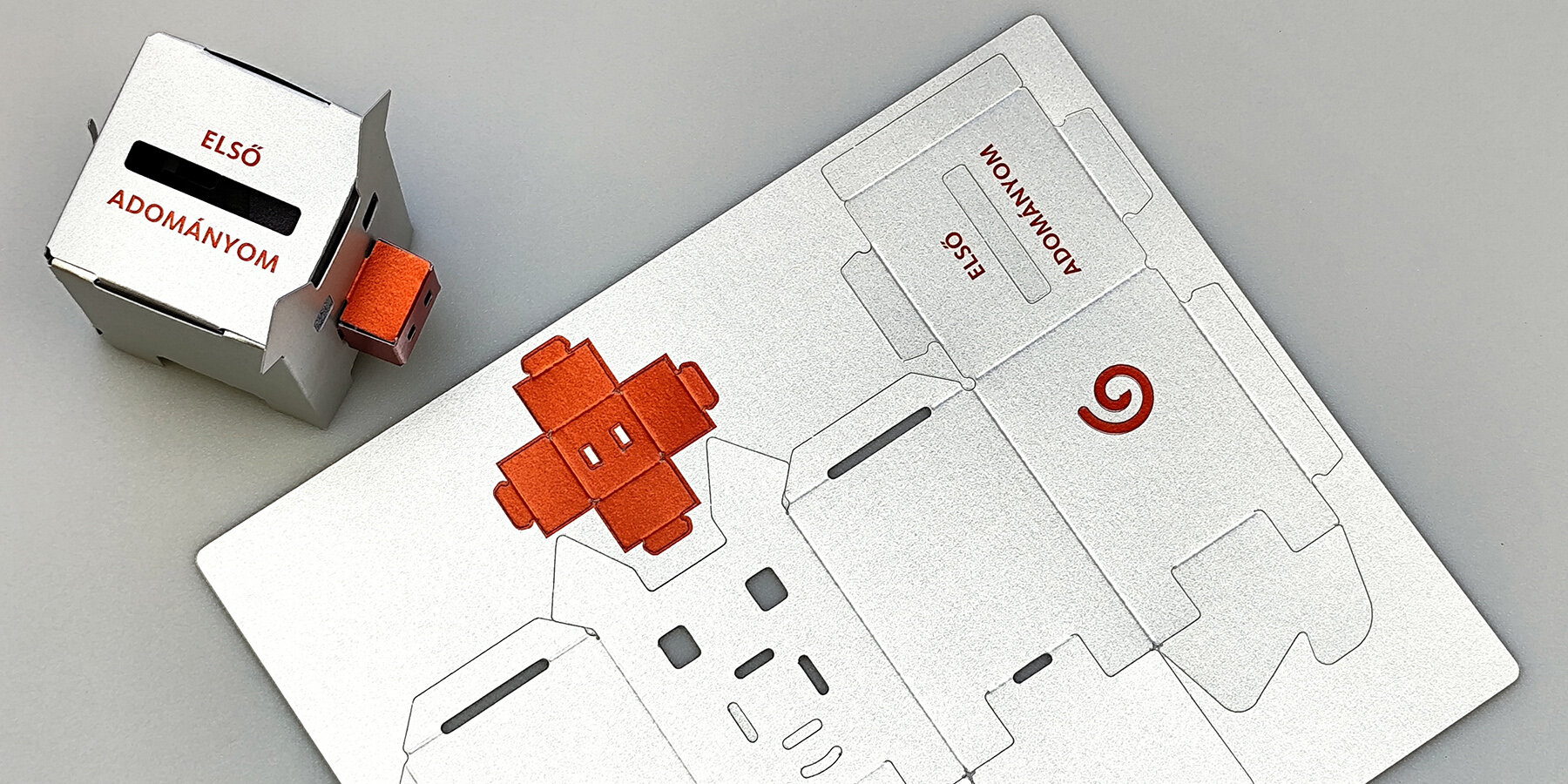 metallic-piggy-bank-paper-PLANBUREAU-studio-designboom-ban