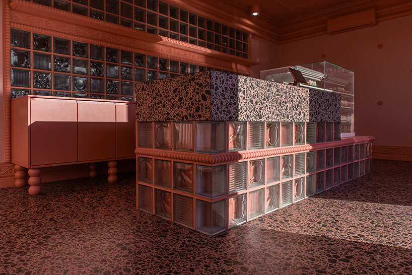 mode:lina™ frosts a tiny cake studio in poland with jelly-like glass and confectionery detailing