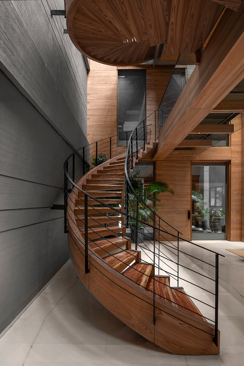 atrey and associates' brutalist home pairs climatic intelligence with material honesty