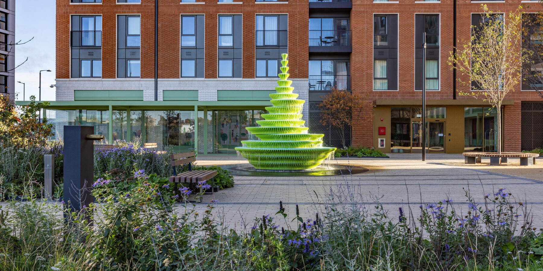 neon-fountain-sculptural-water-feature-brent-cross-town-london-designboom-1800-3