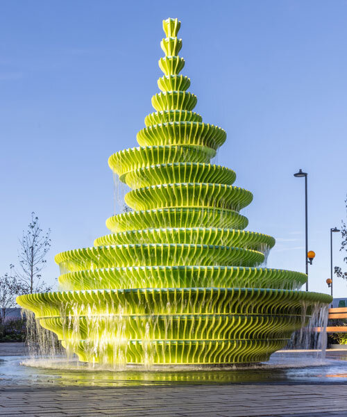 NEON stacks sculptural plates into bright green asymmetrical fountain in london
