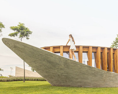 curving concrete walls encircle nest chapel’s intimate timber core in são paulo