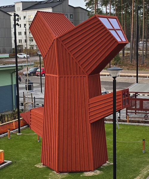 hexagonal wooden forms shape totemic red oak house tower by ulf mejergren in sweden