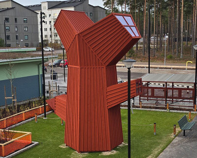 hexagonal wooden forms shape totemic red oak house tower by ulf mejergren in sweden