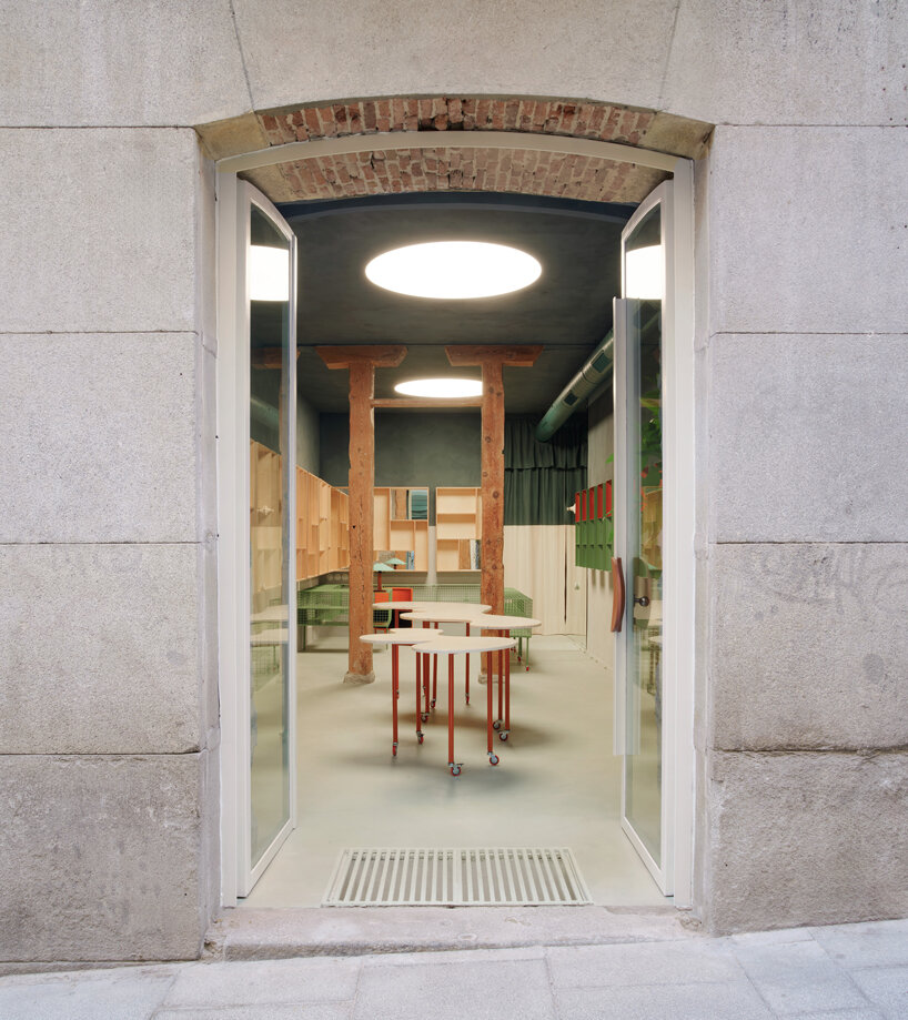 organic marble tables and vibrant hues complete madrid store by lucas y hern&aacute;ndez-gil