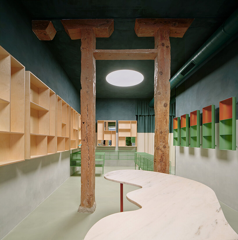 organic marble tables and vibrant hues complete madrid store by lucas y hern&aacute;ndez-gil