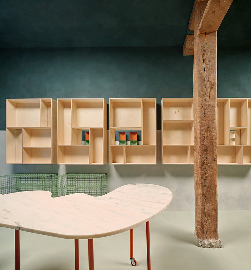 organic marble tables and vibrant hues complete madrid store by lucas y hern&aacute;ndez-gil