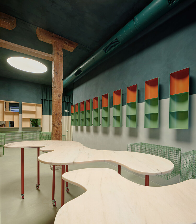 organic marble tables and vibrant hues complete madrid store by lucas y hern&aacute;ndez-gil
