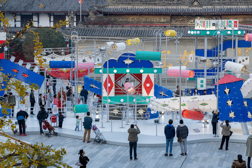 playful rolling ball installation by drawing architecture studio transforms chengdu plaza