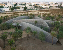 RCR arquitectes' house rises like a blooming structure of ribbed petals in the dubai desert