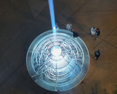 reflective pyramidal monument emits sky-tracing beam of white light in saudi arabia
