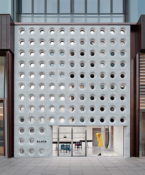 sculptural marble facade by halleroed fronts alaïa's first china flagship in beijing
