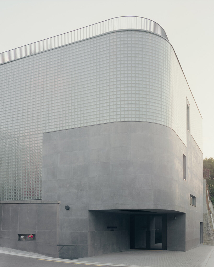 stocker lee architetti wraps MANMADE seoul with textile-like concrete and glass blocks
