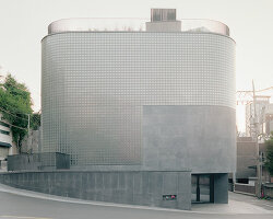 stocker lee architetti wraps MANMADE seoul with textile-like concrete and glass blocks