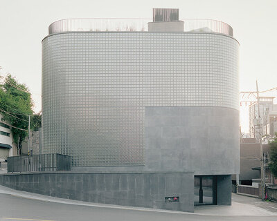 stocker lee architetti wraps MANMADE seoul with textile-like concrete and glass blocks