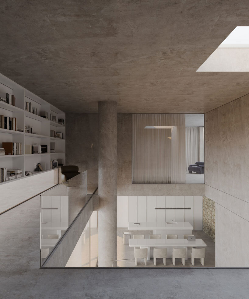 clad in timber, stone house by SHOVK perches over rocky oceanfront slope in portugal