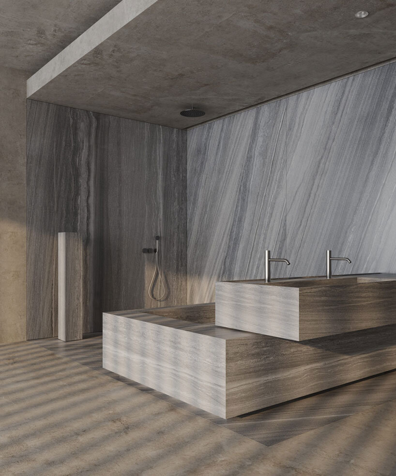 clad in timber, stone house by SHOVK perches over rocky oceanfront slope in portugal