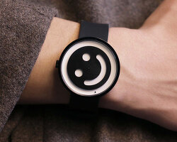 stuart semple creates a watch that smiles at you instead of telling the time