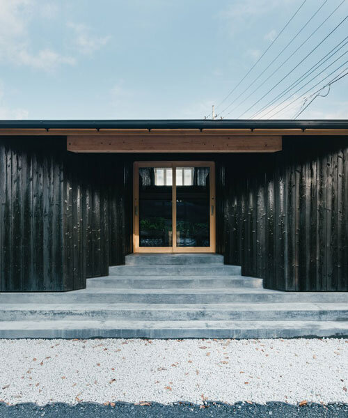 charred cedar facade enfolds kiln-inspired sauna in japan