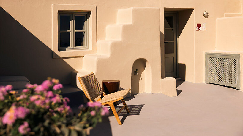 urban soul project redefines the santorini palette through bold red hotel design