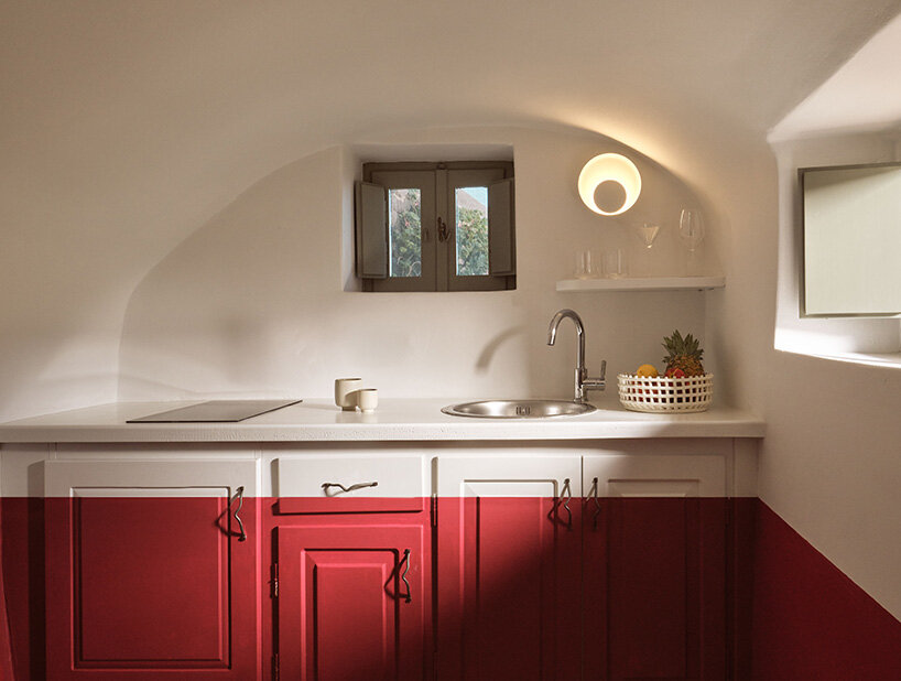urban soul project redefines the santorini palette through bold red hotel design