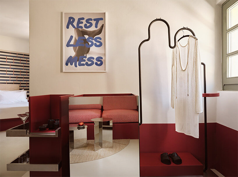 urban soul project redefines the santorini palette through bold red hotel design