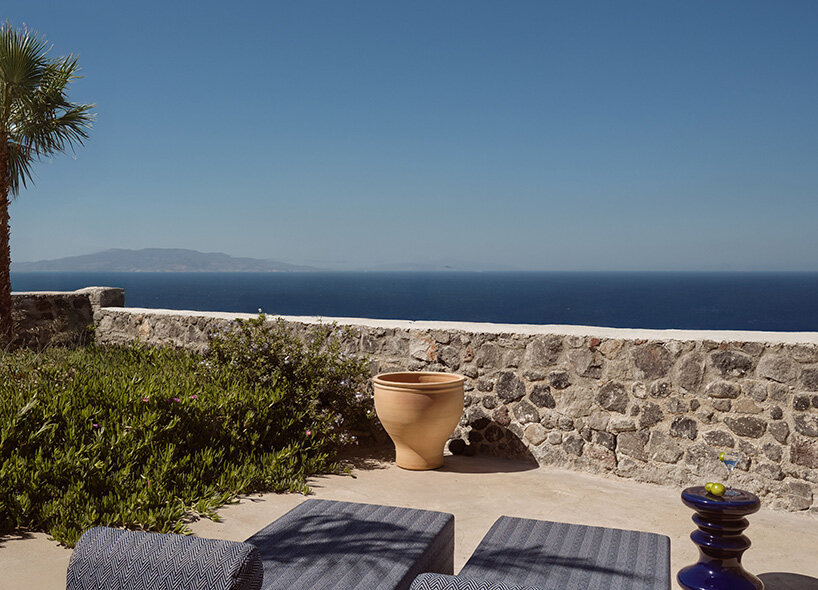 urban soul project redefines the santorini palette through bold red hotel design