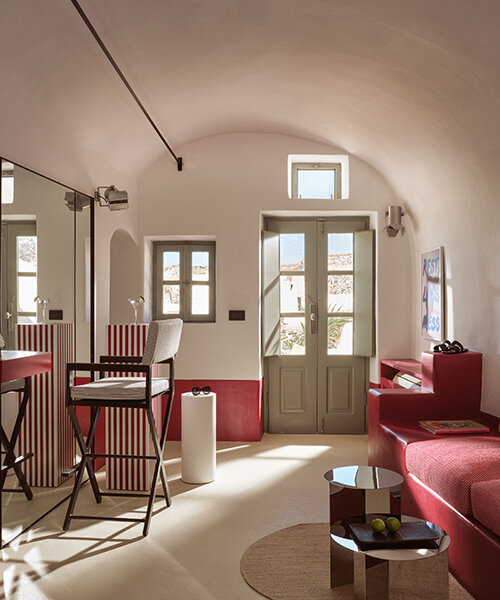 urban soul project redefines the santorini palette through bold red hotel design