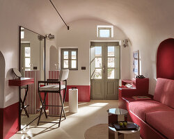 urban soul project redefines the santorini palette through bold red hotel design