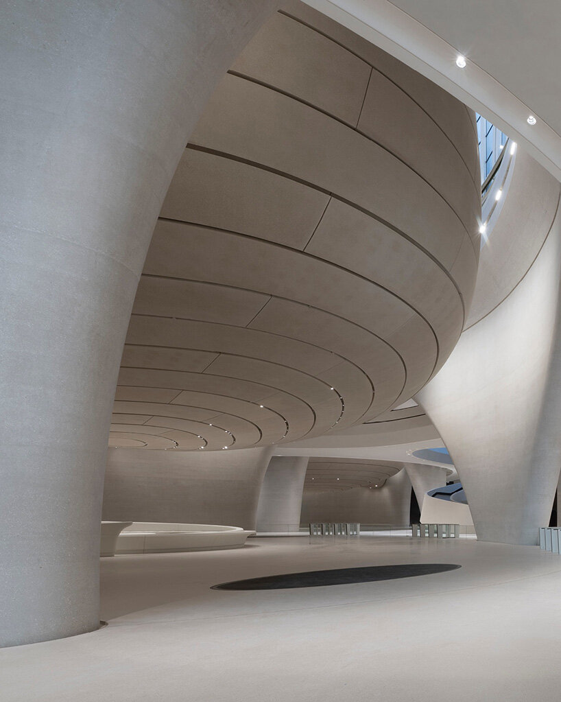 zayed national museum by foster + partners spreads its steel wings over abu dhabi