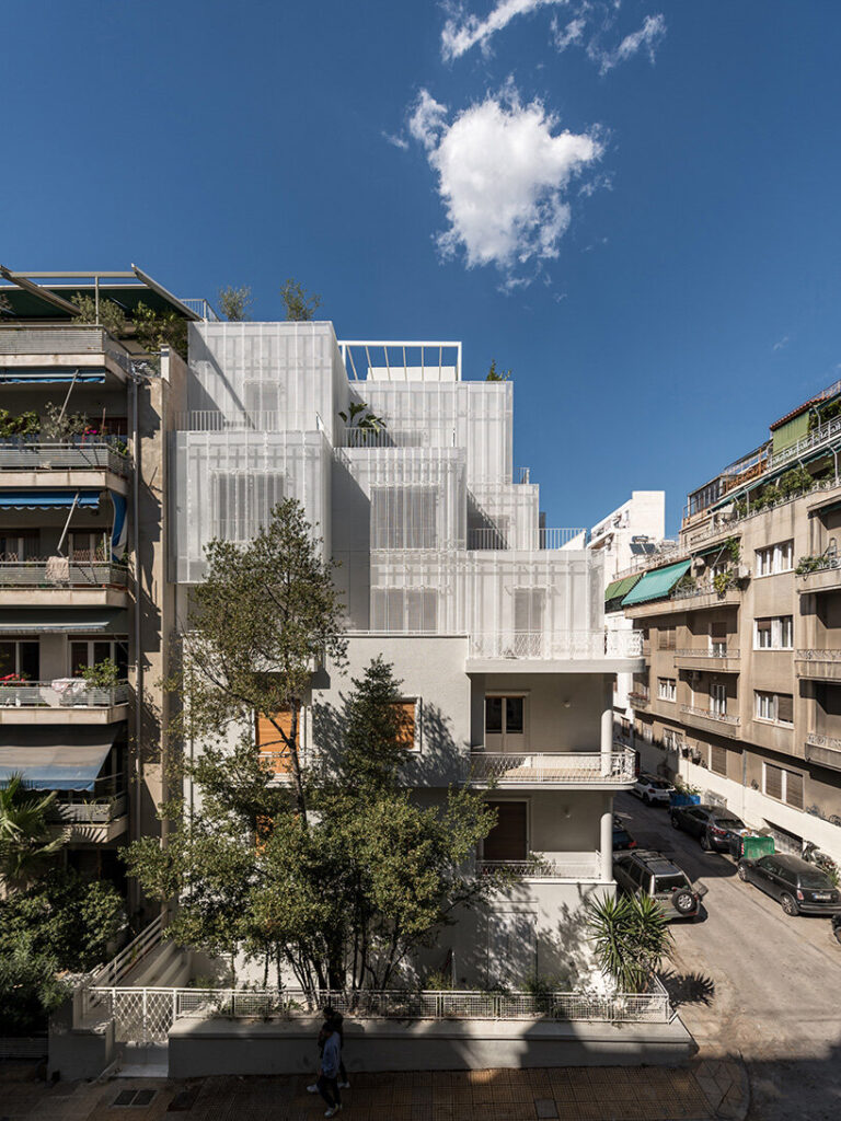 Layered Bricks Pattern arid layers lightweight volumes atop 1950s building in athens