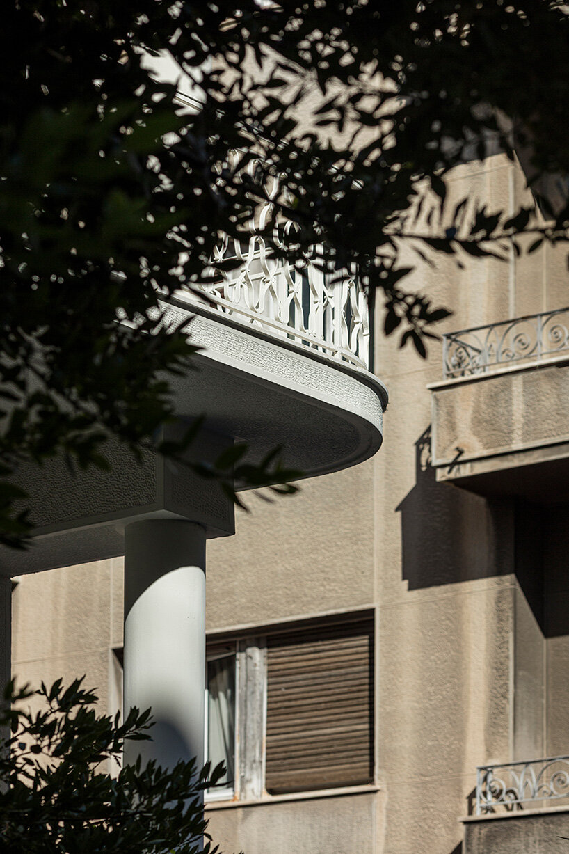 layered lightweight volumes by arid extend 1950s building in patissia, athens