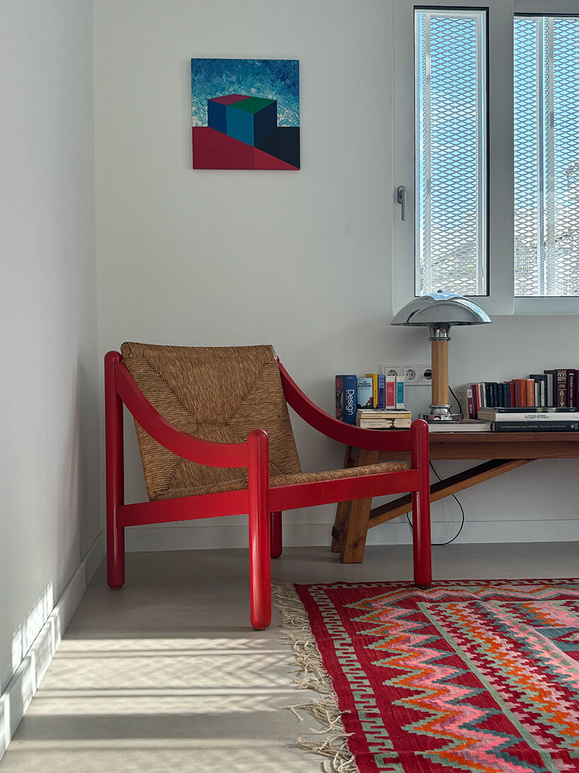 layered lightweight volumes by arid extend 1950s building in patissia, athens