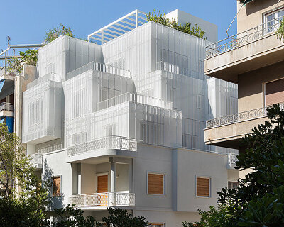 layered lightweight volumes by arid extend 1950s building in patissia, athens