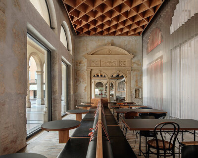 step inside caffè nazionale, AMAA's renovation of a northern italian palazzo